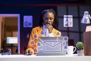 A business women replying to internal emails