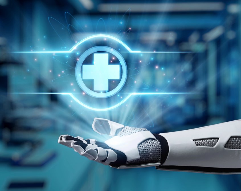Close up of robot hand, open palm with a medical cross hologram hovering above it